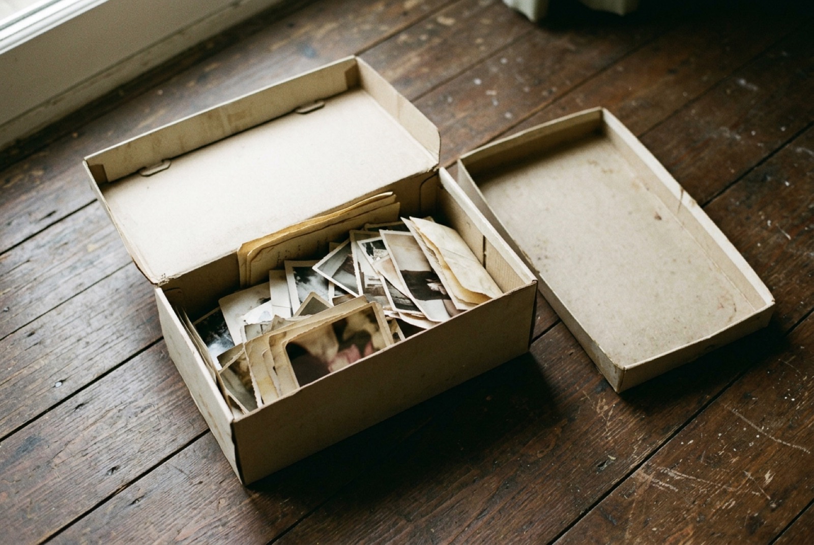 A box of old family photographs